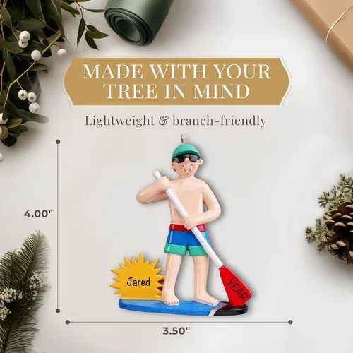 Vista 4 de Adorno personalizado de tabla de remo 2026 Adornos de Navidad deportivos grabados con láser para árbol Regalo de recuerdo personalizado para Niño
