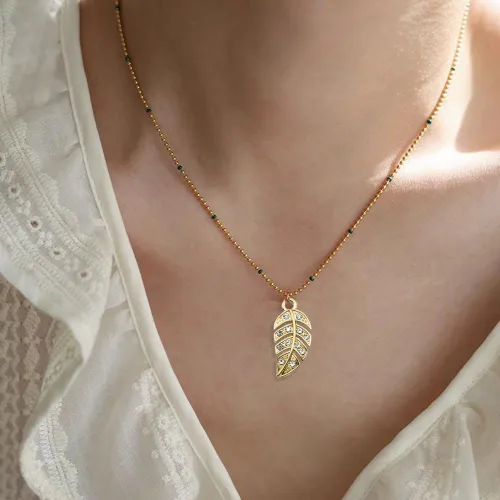 Vista 8 de Dijes creativos de diamantes de imitación de hojas, 20 piezas, dijes de hoja de aleación para bricolaje, llavero, collar, aretes, accesorios de Oro