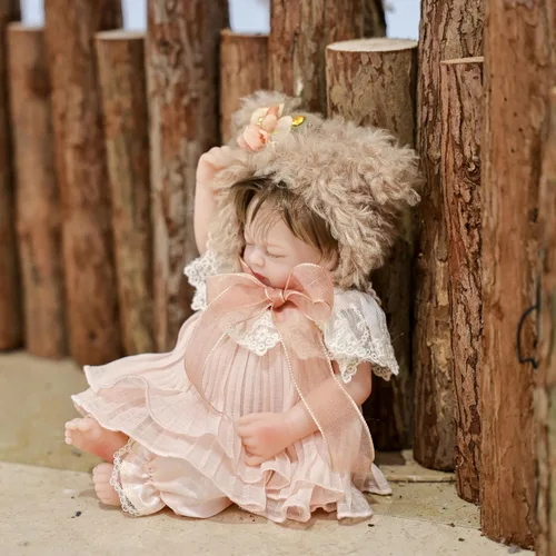 Vista 5 de Muñeca Reborn de 12 pulgadas, cuerpo de vinilo completo, realista, con sombrero de oso marrón y características suaves, regalo cómodo para niños