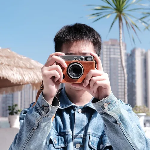 Vista 6 de Rieibi Mini EVO - Funda protectora de piel sintética retro para cámara instantánea Fujifilm Instax Mini EVO - Funda extraíble con correa ajustable