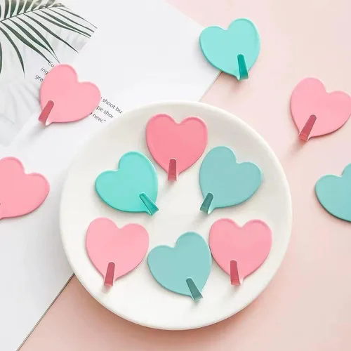 Vista 4 de JtmyAota Paquete de 6 ganchos decorativos de pared en forma de corazón, gancho de pared adhesivo fuerte de acero inoxidable para el hogar, cocina