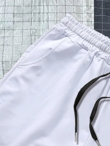 Vista 5 de GORGLITTER Pantalones cortos gráficos para hombre con cordón en la cintura para entrenamiento, ropa de calle corta con bolsillos