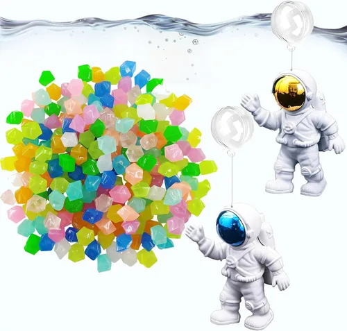 Vista 4 de Muzero Juego de decoración flotante para acuario de pecera, 100 guijarros que brillan en la oscuridad y 2 adornos flotantes de astronautas