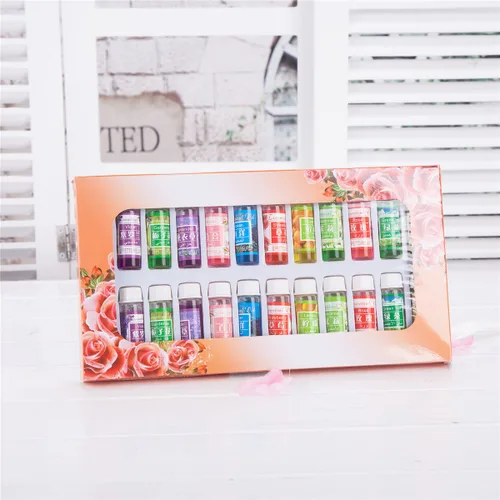 Vista 4 de Un paquete de 24 aceites aromáticos de perfume aromático en 12 aromas diferentes de 0.17 onzas líquidas cada botella