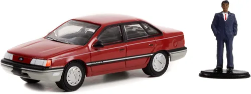 Vista 2 de Toy Cars 1989 Tauro rojo con rayas negras y asociado en traje figura The Hobby Shop Series 13 1/64 modelo de coche fundido a presión por Greenlight