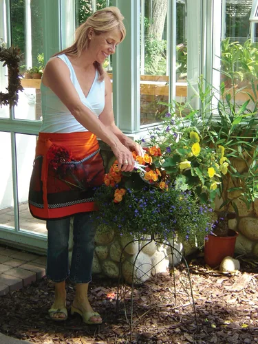 Vista 2 de Dramm 18022 Cizalla compacta de acero inoxidable, naranja