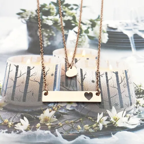 Vista 3 de JJTZX - Juego de collares dijes de corazón y de orificios en forma de corazón para mamá e hija (s)