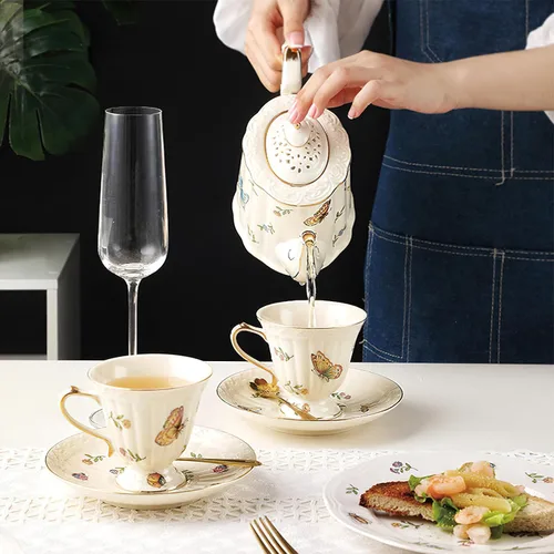 Vista 3 de Juego de taza de té y platillo de porcelana, taza de café de cerámica de 8.5 onzas líquidas con platillo y cuchara, taza de café vintage con ribete