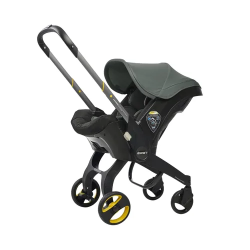 Vista 10 de Doona - Asiento de automóvil y cochecito, Azul profundo - Sistema de viaje todo en uno