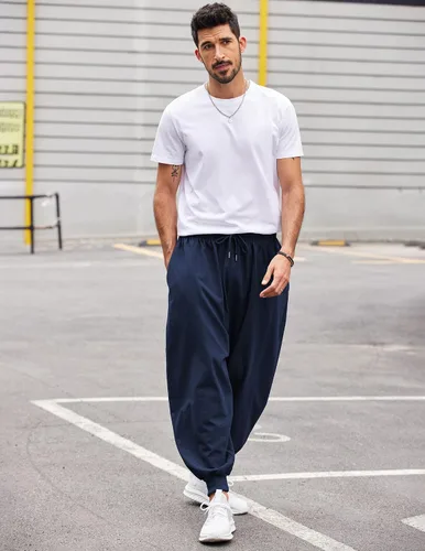 Vista 3 de COOFANDY Pantalones de harén hippie para hombre, holgados, de lino, bohemio, para yoga, casual, con entrepierna caída, pantalones