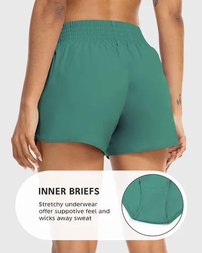Vista 3 de YEZII Pantalones cortos deportivos para mujer con bolsillos, cintura alta, pantalones cortos de entrenamiento para correr, gimnasio, yoga