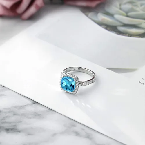 Vista 6 de Gem Stone King Anillo de compromiso de plata de ley 925 con topacio azul suizo y zafiro blanco creado para mujer