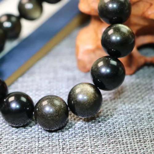 Vista 4 de Jan Dee Pulsera de cristal PiXiu de obsidiana natural y semipreciosa