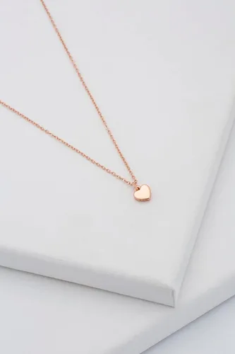 Vista 8 de Ted Baker Hara - Collar con dije de corazón pequeño, opciones de tono plateado o oro rosa, Latón