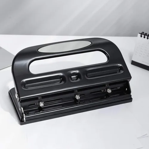 Vista 7 de Amazon Basics Perforadora de 2/3 agujeros, semiajustable, capacidad de 30 hojas, color negro