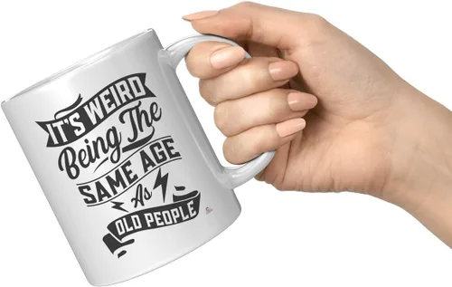 Vista 7 de ODDITEES Taza de café divertida con texto en inglés "It's Weird Being The Same Age As Old People", 11 onzas, color blanco