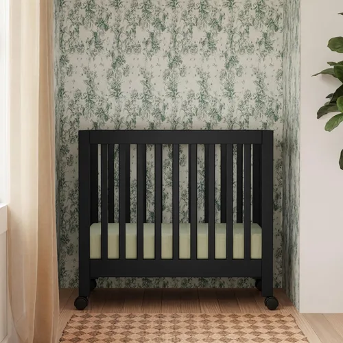 Vista 2 de Babyletto Origami Mini cuna plegable portátil con ruedas en negro, 2 posiciones de colchón ajustables, certificado Greenguard Gold