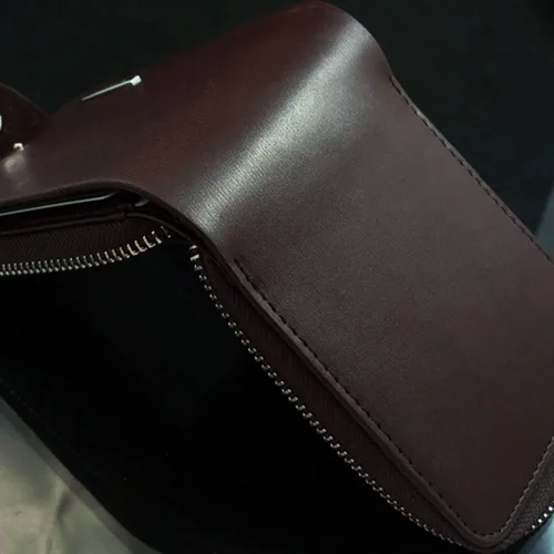 Vista 9 de Encantador bolso de cuero plegable para hombre con cremallera