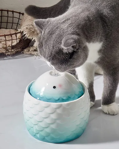 Vista 2 de Fuente de agua automática de cerámica para gatos, cascada, lindo dispensador silencioso de porcelana para gatos de interior, fácil de limpiar, 1 Azul