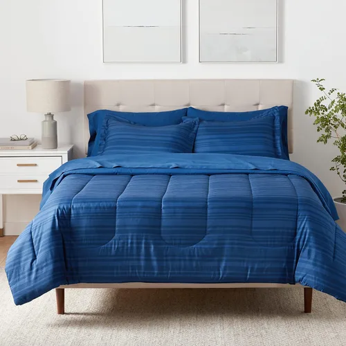 Vista 23 de Amazon Basics - Juego de edredón Twin/Twin XL con sábanas, juego de ropa de cama de 5 piezas, microfibra ligera azul Calvin a rayas, en una bolsa