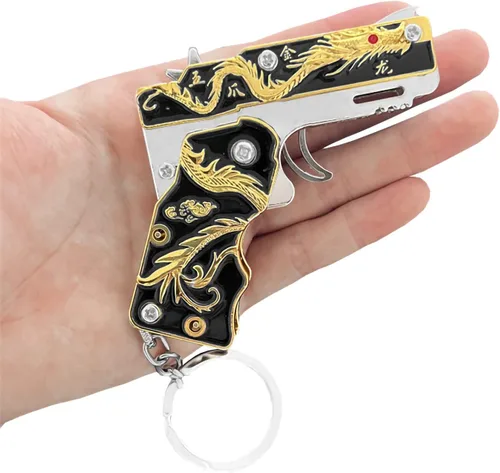 Vista 7 de 2pcs mini oro dragón goma banda pistola metal plegable llavero nuevas e interesantes goma banda juguete pistola al aire libre regalo fiesta