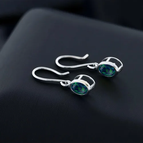 Vista 123 de Gem Stone King Aretes colgantes de plata de ley 925 de 0.276 x 0.197 in con piedra natal ovalada de alambre francés para mujer