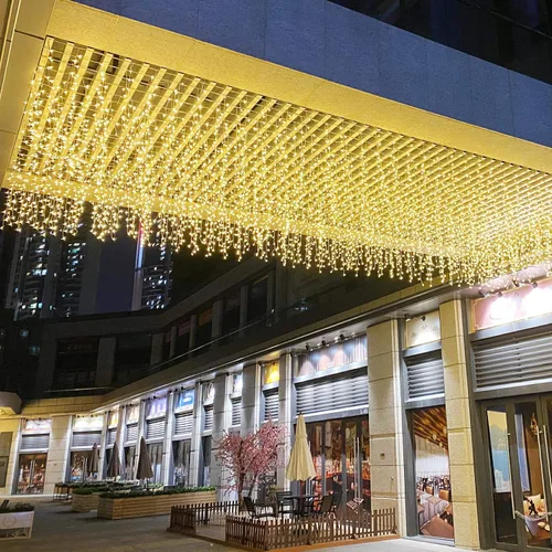 Vista 7 de ZIMINGU Luces de goteo de carámbanos, 13 pies, 144 LED, 8 modos de Navidad conectables para ventana, cortina de ventana de cascada de hadas, tira
