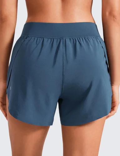 Vista 2 de CRZ YOGA Pantalones cortos deportivos de cintura media para mujer, ligeros, con abertura alta, con forro, de secado rápido