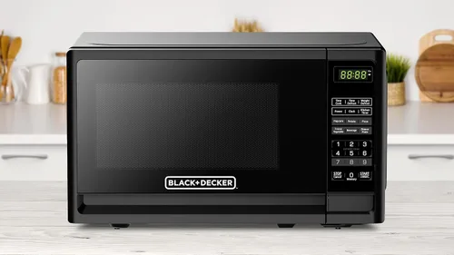 Vista 5 de BLACK+DECKER Horno de microondas compacto de encimera de 700 vatios de 0.7 pies cúbicos con iluminación LED, bloqueo para niños Negro