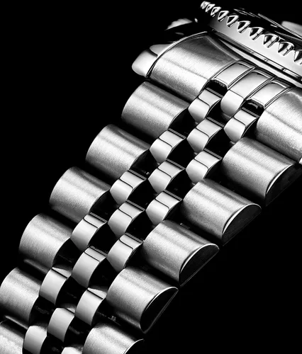 Vista 4 de Stuhrling Original Pulsera Jubilee de acero inoxidable para hombre, reloj GMT de cuarzo, doble hora, fecha rápida con corona de tornillo, resistente