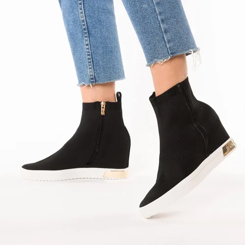 Vista 2 de DKNY Tenis de cuña sin cordones para mujer