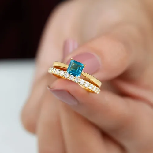 Vista 3 de Juego de anillos de boda de topacio azul Londres con diamante, juego de anillos solitarios de topacio azul de corte princesa para mujer (calidad AAA)