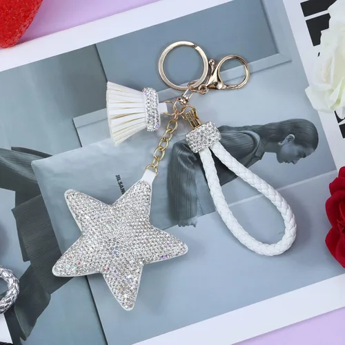 Vista 4 de Llavero para mujer con diamantes de imitación con purpurina, bonitos llaveros de estrella para niñas, bolso de cuero, llaveros de coche
