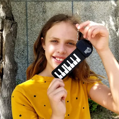 Vista 2 de Rock and Roll It - Micro Piano. Llavero de piano de trabajo real y jugable. Cuélgalo en una mochila y juega en cualquier lugar. Alfombrilla de piano