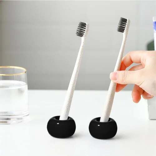 Vista 4 de Mini soporte para cepillos de dientes de cerámica para encimera de tocador de baño, cabezal de cepillo de dientes hecho a mano y soporte para Negro