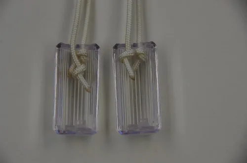 Vista 9 de Piezas para persianas de ventana. Borla de cable horizontal segura, forma de cilindro. Perilla de separación que se separará cuando se aplica exceso