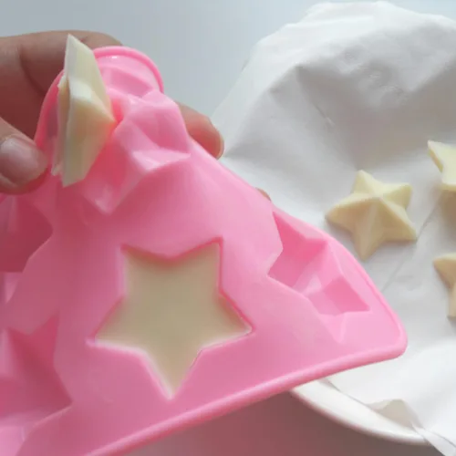 Vista 6 de Molde de chocolate con estrella, reutilizable de silicona de cinco puntas para hacer chocolates, cubitos de hielo, gelatinas y dulces (rosa)