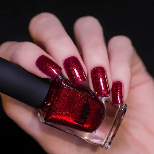 Vista 3 de ILNP Ruby - Esmalte de uñas rojo brillante con brillo vibrante