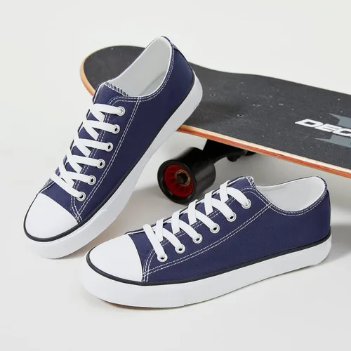 Vista 4 de yageyan Zapatos bajos de lona para hombre Zapatillas casuales clásicas Zapatos de moda en blanco y negro