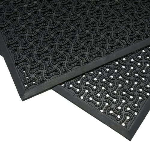 Vista 5 de Rubber-Cal 03-236-DR "DuraScraper Drainage", tapete comercial para entrada de 3/8" de grosor x 24" x 36", color negro.