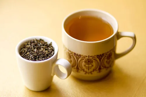 Vista 5 de Té Golden Moon Orgánico de Jazmín Verde - Hojas y Flores de la Mejor Calidad - Hojas Sueltas, Sin OMG - 1 Libra (192 Porciones)