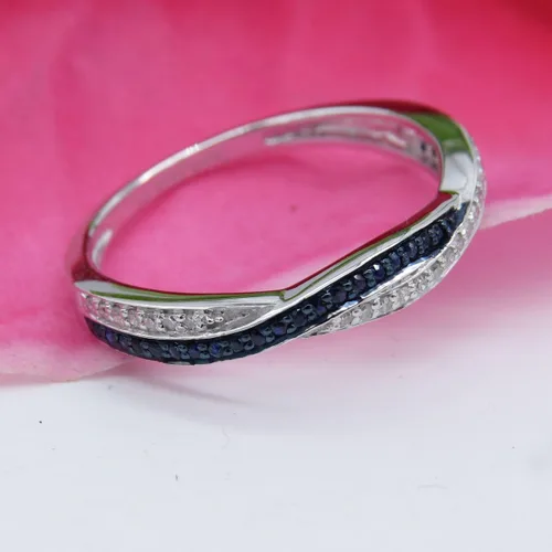 Vista 8 de Dazzlingrock Collection Anillo de compromiso redondo con zafiro azul y diamante blanco entrecruzado para mujer en oro macizo de 10 quilates