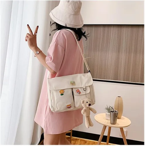 Vista 2 de Bolso cruzado de lona con alfileres Kawaii y colgante bolso de mensajero casual para estudiantes mochila escolar para niñas y mujeres