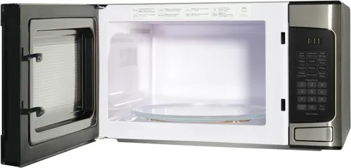 Vista 6 de GE Horno microondas para encimera, compacto de 1.1 pies cúbicos, capacidad de 950 vatios, 6 ajustes de cocción automática, tecnología de bloqueo