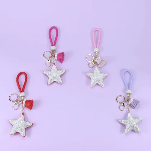 Vista 8 de Llavero para mujer con diamantes de imitación con purpurina, bonitos llaveros de estrella para niñas, bolso de cuero, llaveros de coche
