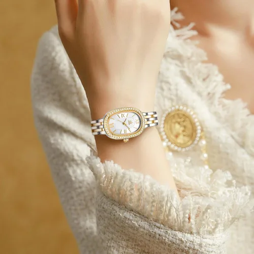 Vista 2 de SHENGKE SK - Reloj de pulsera de acero de aleación sólida con detalles de cristal ovalado para mujer