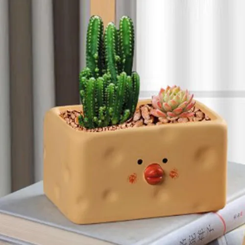 Vista 4 de TOPINCN Maceta amarilla de cerámica para pollitos de dibujos animados, maceta para suculentas para interiores y exteriores, decoración del jardín