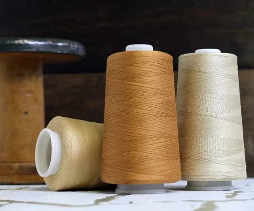 Vista 3 de Hilo de algodón resistente 8,200 pies - 40/3-17 colores disponibles. Heavy-duty cotton thread for quilting, sewing and topstitching. Strong cone
