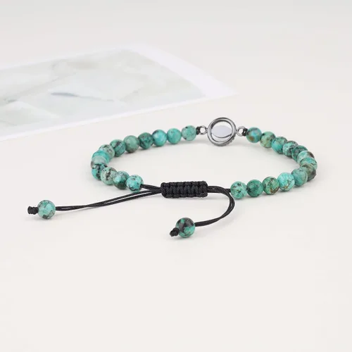 Vista 6 de COAI Pulsera de mal de ojo con cuentas de piedra