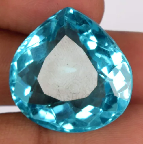 Vista 2 de GEMHUB Topacio azul de aproximadamente 70.00 a 80.00 ct en forma de pera topacio creado en laboratorio para la fabricación de joyas, Gema, Brasilia